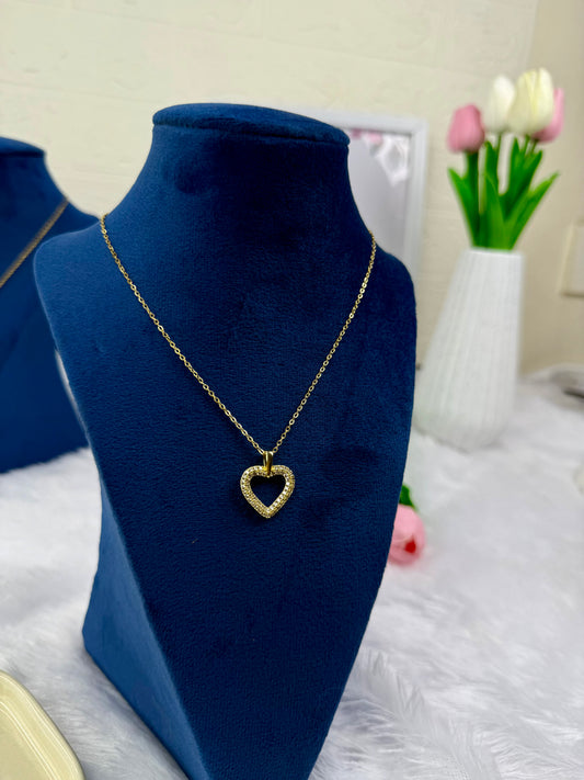 Gold-tone necklace with a heart-shaped pendant