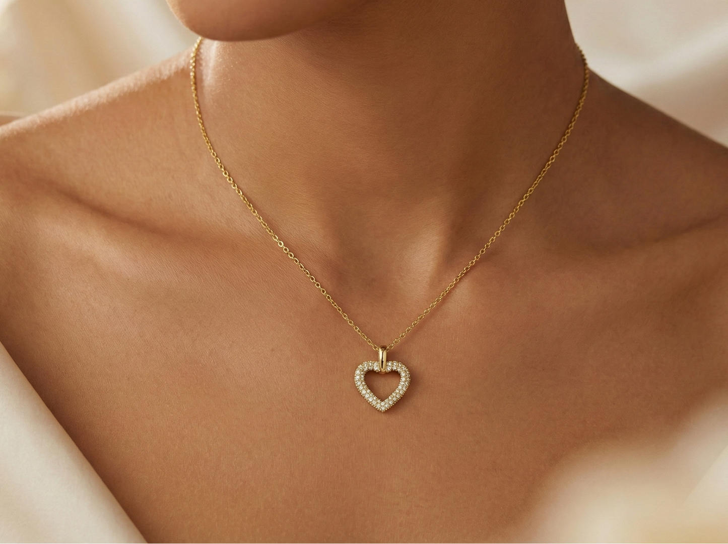 Gold-tone necklace with a heart-shaped pendant